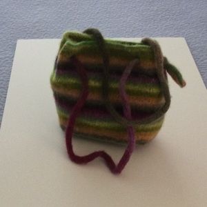 Felted mini bag with snap top.